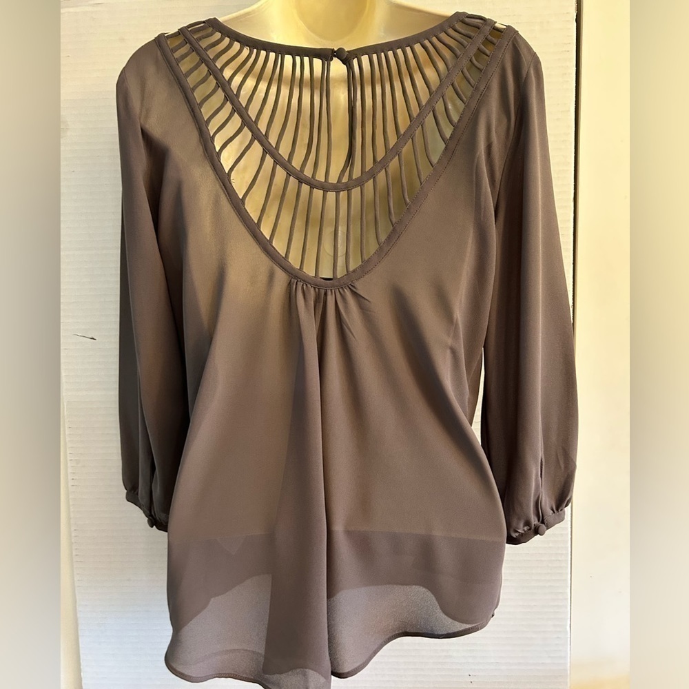 Naked Zebra quarter sleeve blouse with criss‎ criss back detail. Sz S. P20